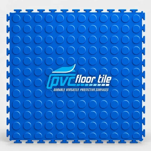 Blue PVC floor tiles with raised circular coin pattern and visible interlocking edges