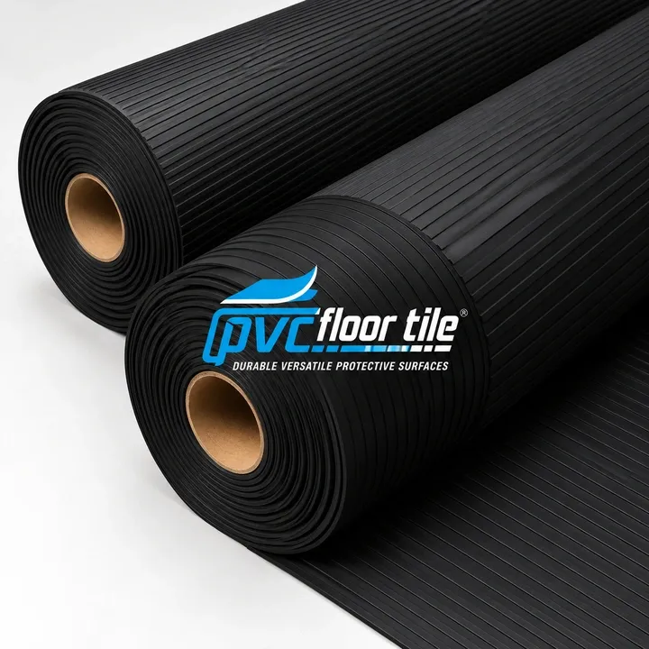 Black Ribbed Rubber Roll – Textured Rubber Flooring Black Ribbed Rubber Roll flooring with parallel raised rib patterns, shown in two partially unrolled rubber mats