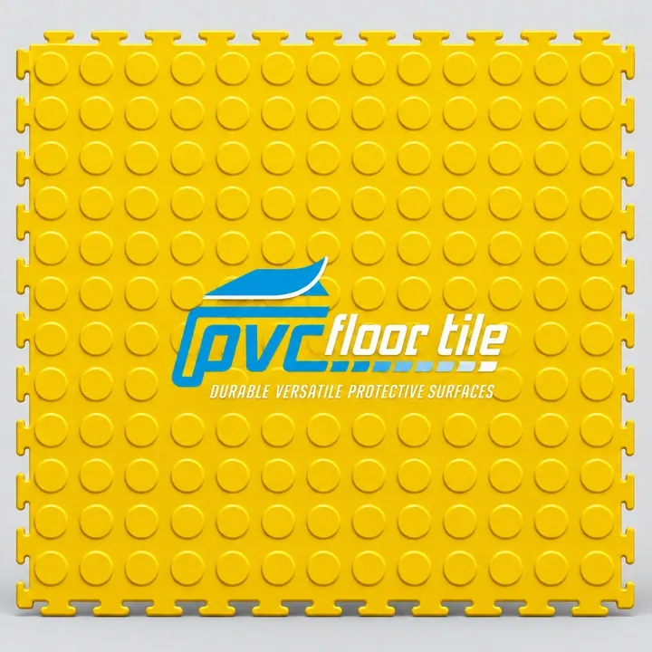 Yellow Heavy-Duty Garage Floor Tiles – Interlocking PVC Flooring Yellow heavy-duty garage floor tiles with raised circular coin pattern and visible interlocking edges